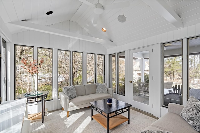 sunroom / solarium featuring lofted ceiling with beams and ceiling fan