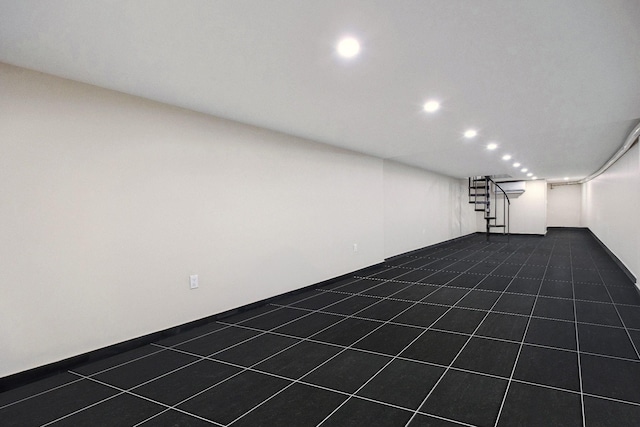 basement with dark tile patterned floors