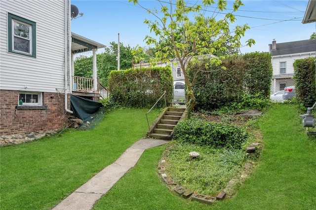 view of yard featuring stairway