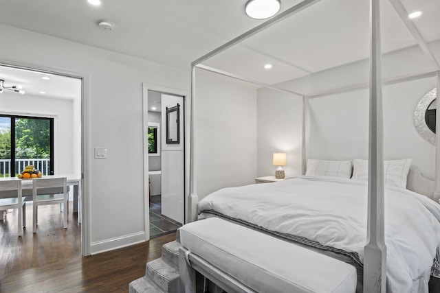 bedroom featuring recessed lighting, baseboards, and wood finished floors