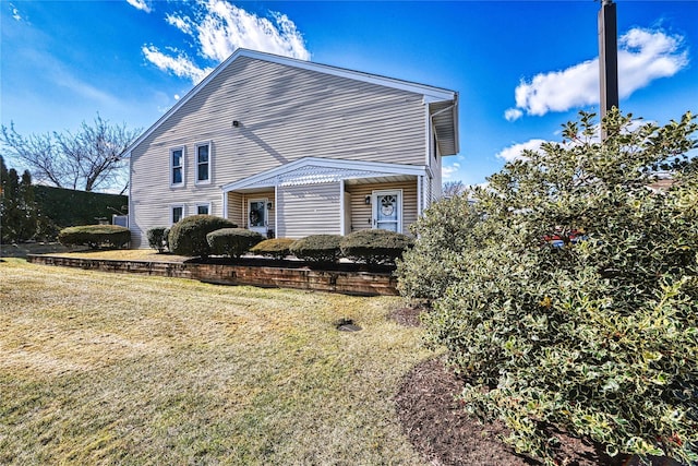 2355 Pershing Blvd Unit 712, Baldwin, NY 11510 - view of front facade with a front lawn