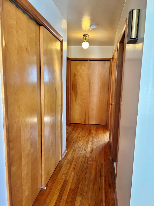 corridor with wood finished floors