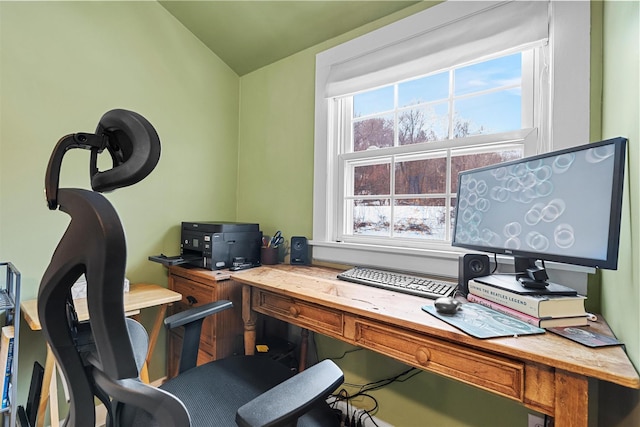 office space featuring lofted ceiling