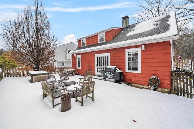 exterior space featuring a hot tub