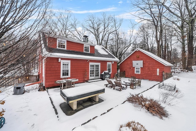 view of snow covered house