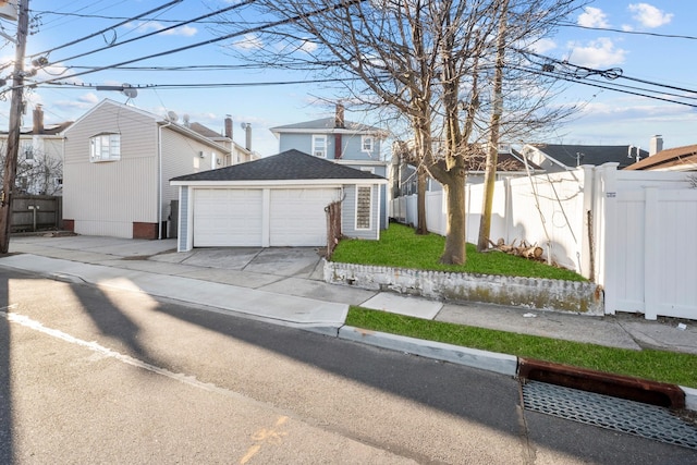 front of property with an outbuilding and a garage