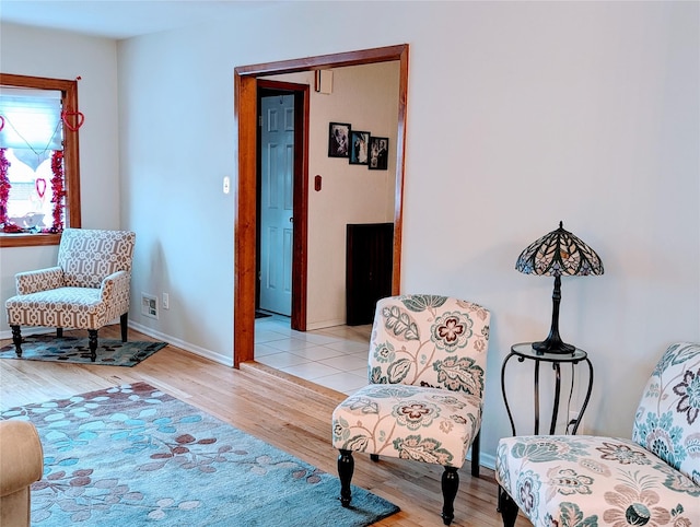 sitting room featuring light wood-type flooring