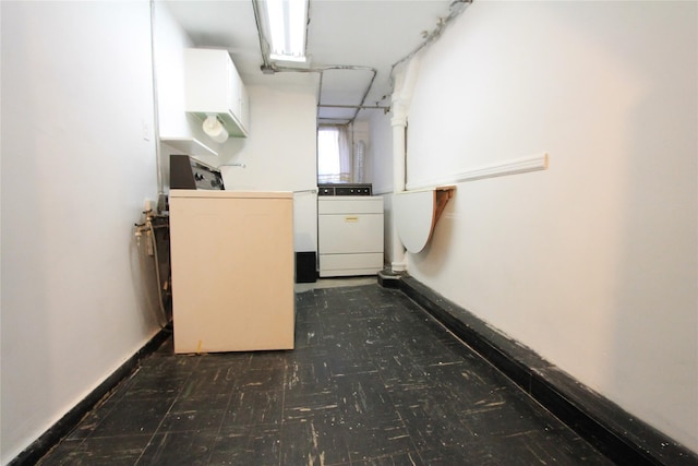 clothes washing area featuring washer and dryer