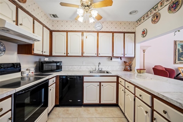 kitchen featuring ceiling fan, under cabinet range hood, a sink, light countertops, and black appliances