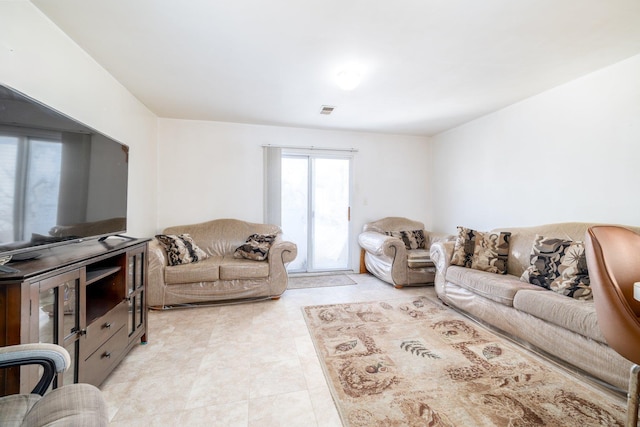 living room featuring light tile patterned floors