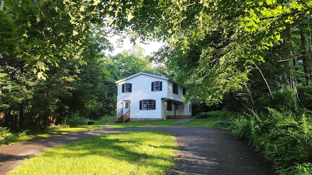 4030 Old Rte 22, Brewster, NY 10509 - view of front facade with a front lawn, driveway, and entry steps