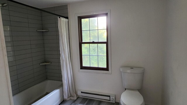 4030 Old Rte 22, Brewster, NY 10509 - bathroom with a baseboard heating unit, healthy amount of natural light, shower / bath combination with curtain, and wood finished floors
