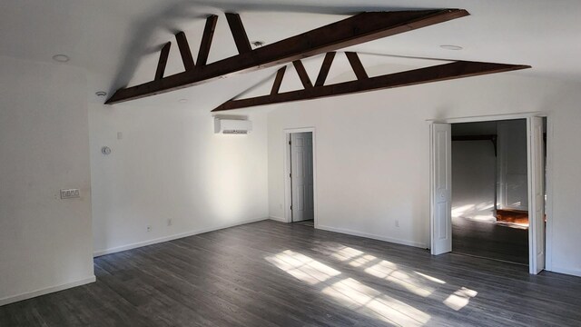 4030 Old Rte 22, Brewster, NY 10509 - empty room featuring an AC wall unit, beam ceiling, dark wood-type flooring, and high vaulted ceiling