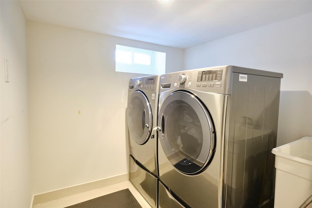 laundry area with washer and dryer