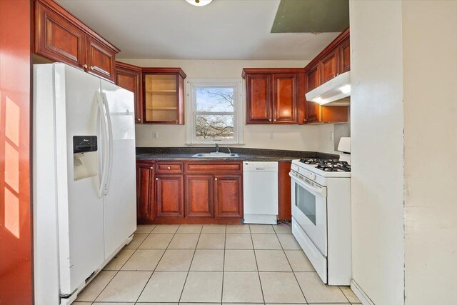 313 Sixth Ave, Pelham, NY 10803 - kitchen featuring white appliances, sink, and light tile patterned floors