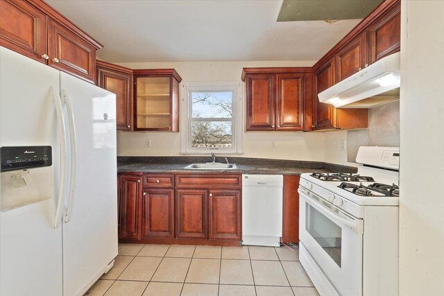 313 Sixth Ave, Pelham, NY 10803 - kitchen featuring white appliances, sink, and light tile patterned floors