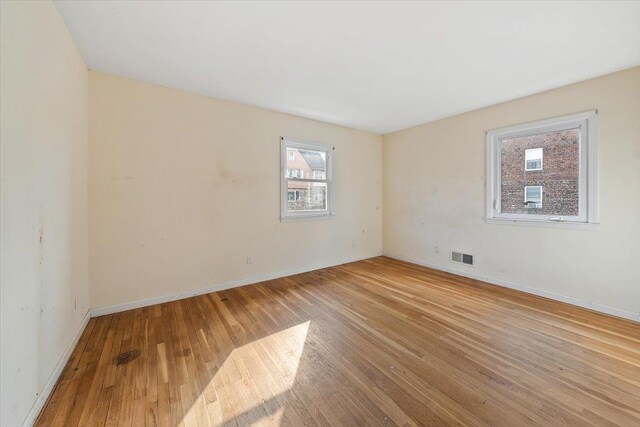 313 Sixth Ave, Pelham, NY 10803 - empty room with light hardwood / wood-style flooring