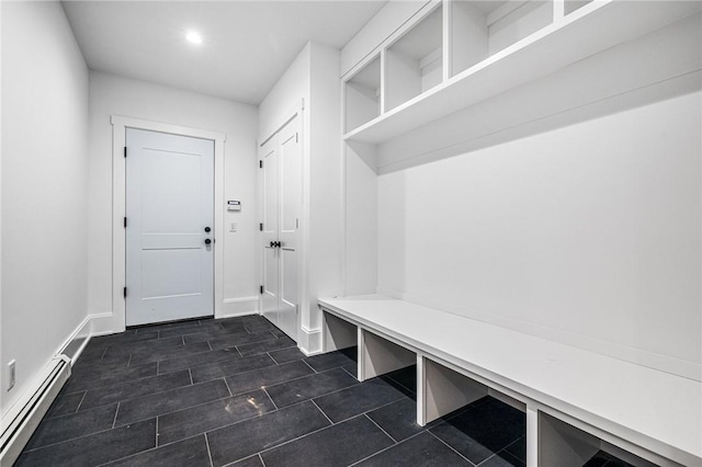 mudroom featuring a baseboard radiator and baseboards