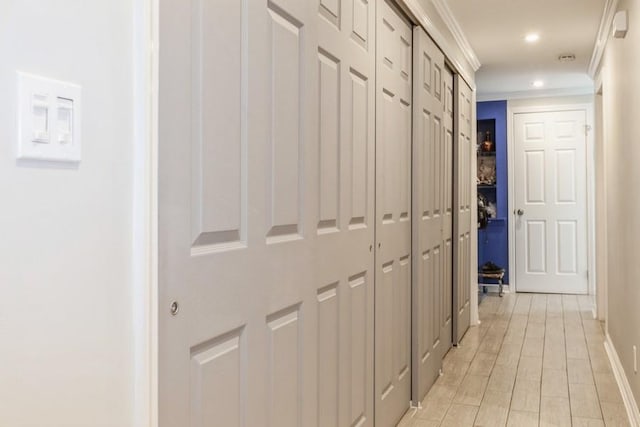 hallway with ornamental molding