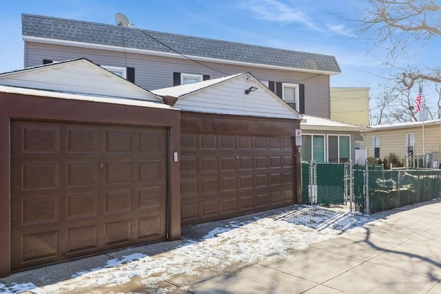 view of snow covered garage