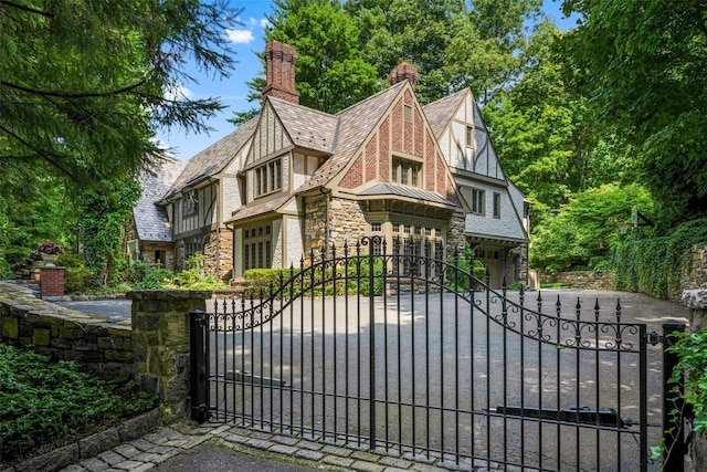 view of gate featuring a fenced front yard