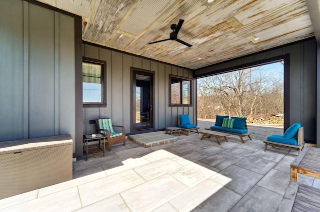 view of patio featuring radiator and ceiling fan