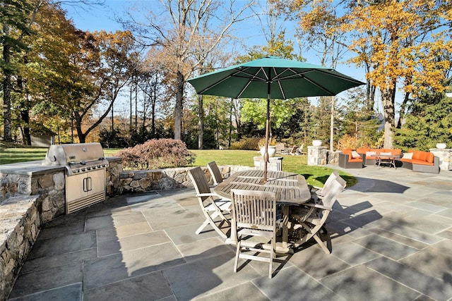 view of patio with an outdoor living space and area for grilling