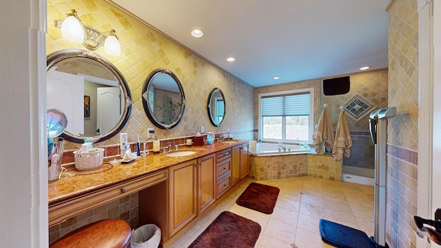 full bath featuring vanity, tiled shower, recessed lighting, a garden tub, and tile patterned floors