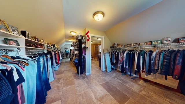 spacious closet featuring lofted ceiling