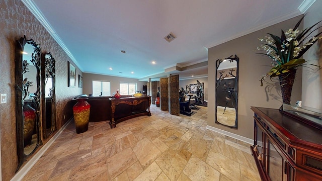 interior space with stone tile floors, baseboards, visible vents, recessed lighting, and ornamental molding