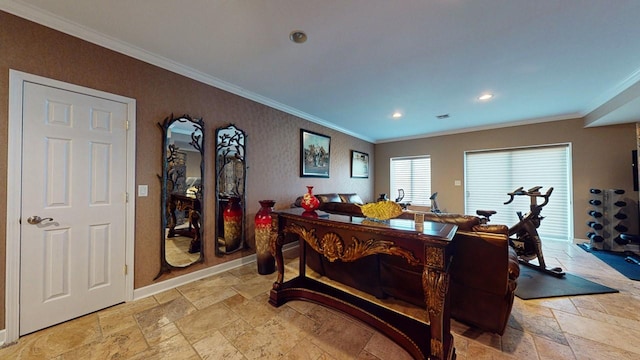 interior space featuring stone tile floors, recessed lighting, baseboards, and ornamental molding