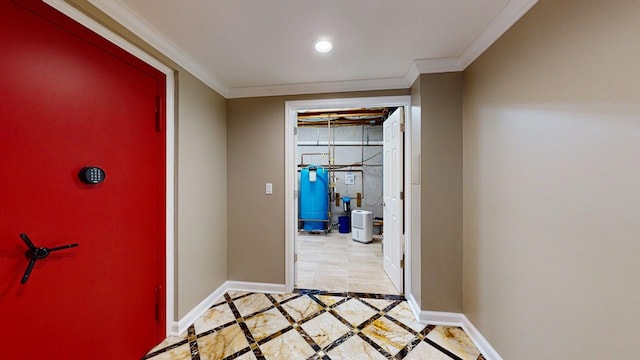 entrance foyer featuring recessed lighting, baseboards, and ornamental molding