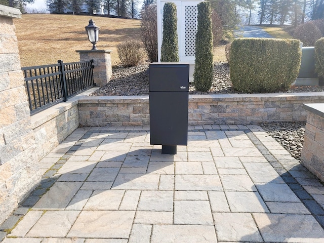 view of patio with fence