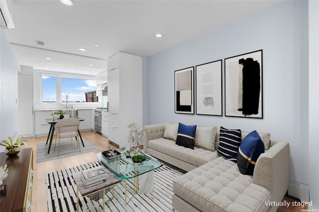 living room with light hardwood / wood-style flooring