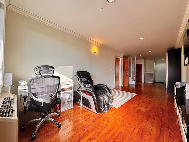 office space with hardwood / wood-style flooring and crown molding