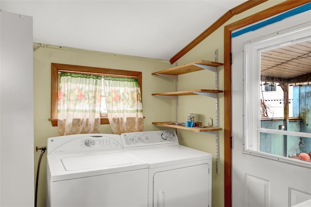 laundry area with ornamental molding, laundry area, and independent washer and dryer