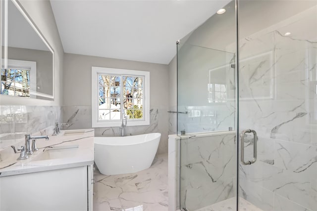 bathroom with vanity, plus walk in shower, and vaulted ceiling