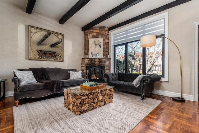 living room featuring a stone fireplace, parquet flooring, and beamed ceiling