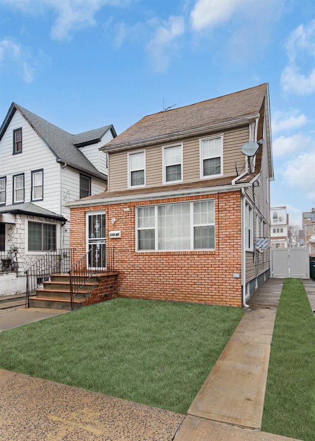 view of front of property with a front lawn