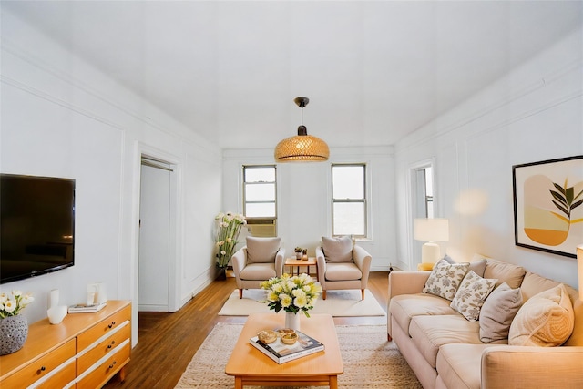 living area featuring dark wood finished floors