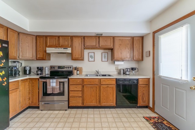 kitchen with sink and black appliances