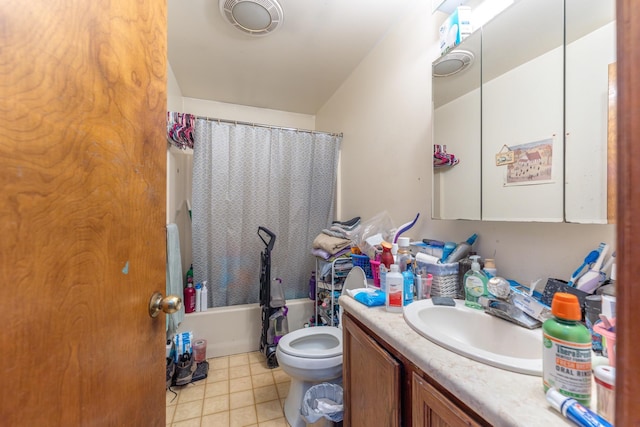 full bathroom with tile patterned flooring, toilet, vanity, and shower / bathtub combination with curtain