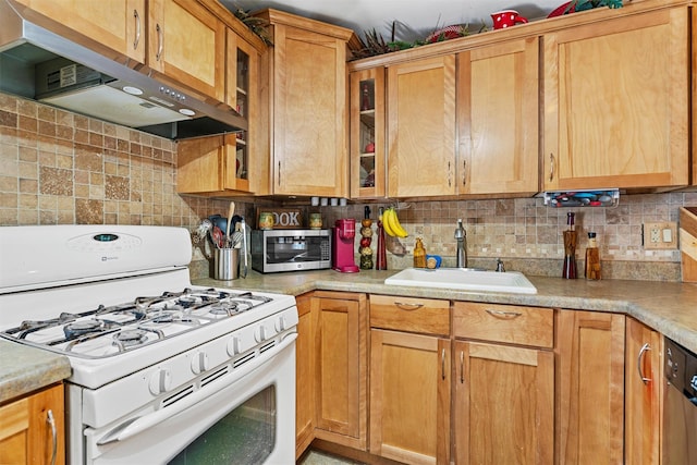 kitchen featuring white range with gas stovetop, stainless steel dishwasher, ventilation hood, backsplash, and sink