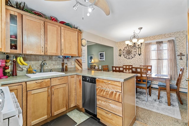 kitchen featuring hanging light fixtures, dishwasher, white stove, sink, and kitchen peninsula