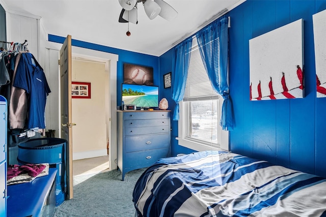 carpeted bedroom featuring ceiling fan