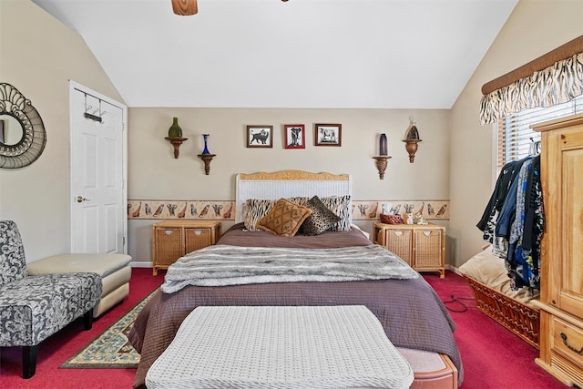 carpeted bedroom with ceiling fan and lofted ceiling