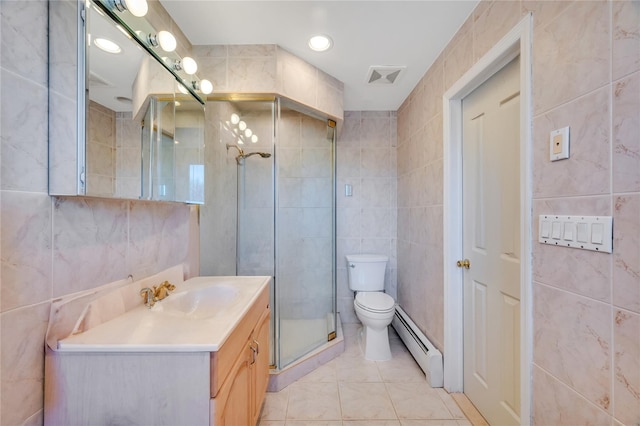 full bathroom featuring a baseboard radiator, visible vents, tile walls, and vanity