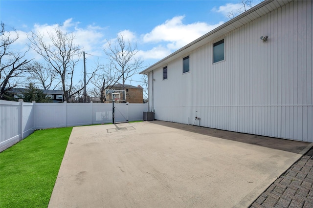 exterior space featuring a fenced backyard and a lawn