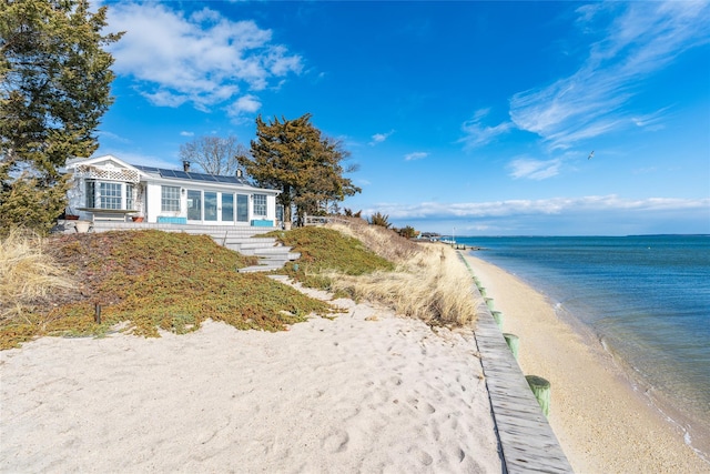 water view featuring a beach view