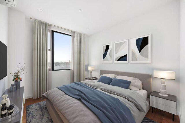 bedroom featuring dark hardwood / wood-style flooring